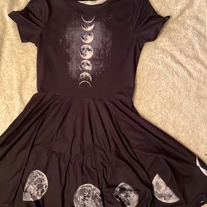 Selling a “moon phases” dress in a size medium for $10